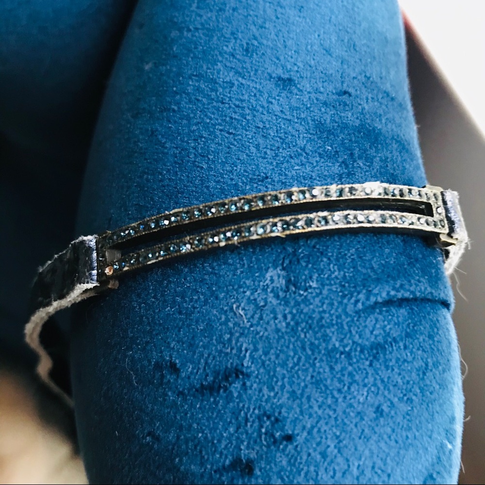 Locally-made distressed leather and rhinestones